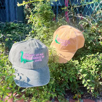 Woman Inherits the Earth mustard Cap